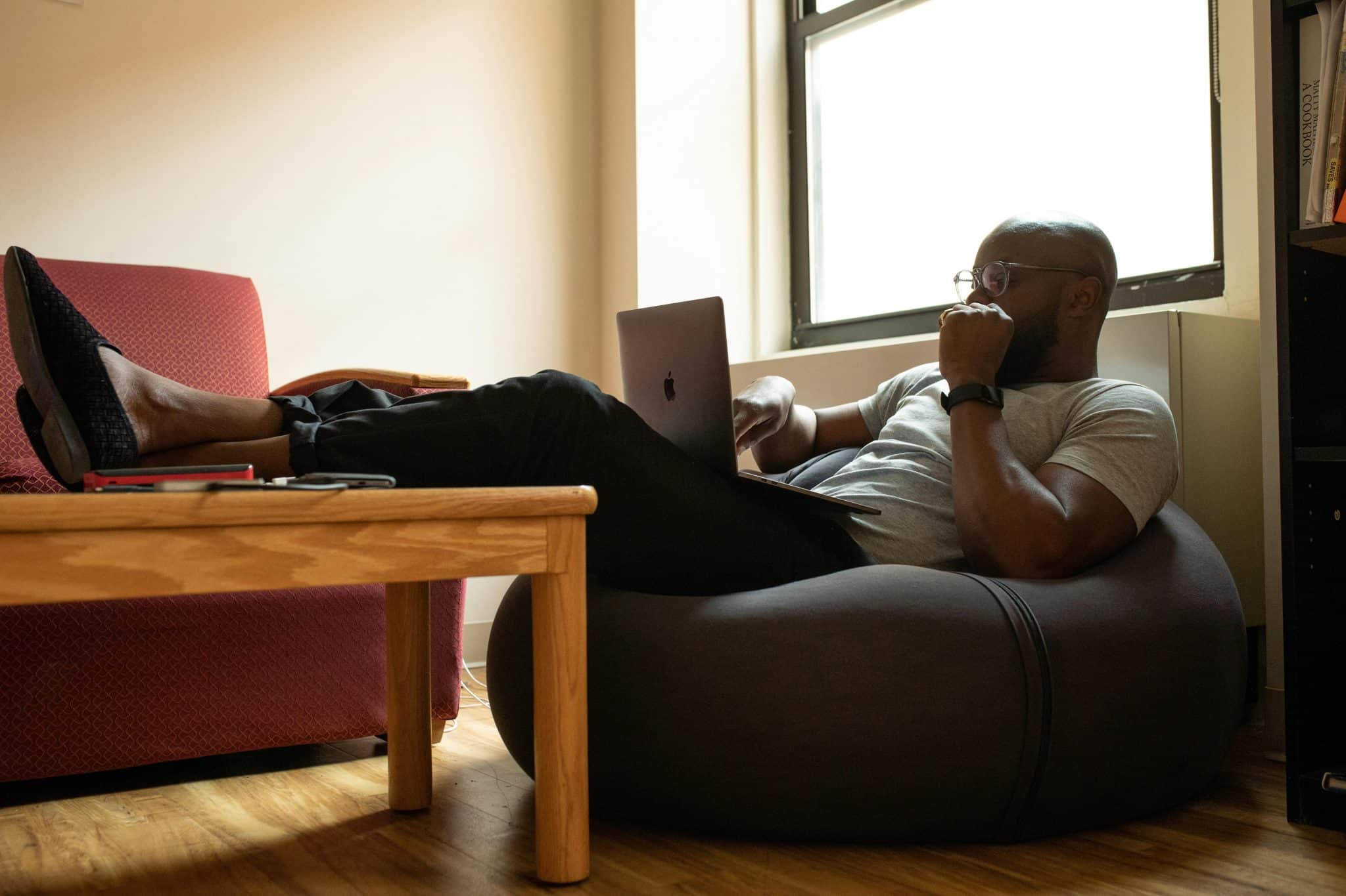 man at laptop at home